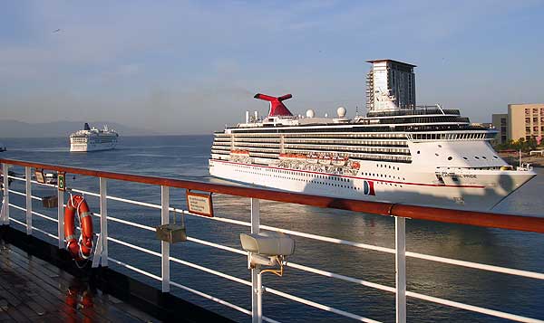 Race to Port Cruise ships crowd the port of Puerto Vallarta, Mexico